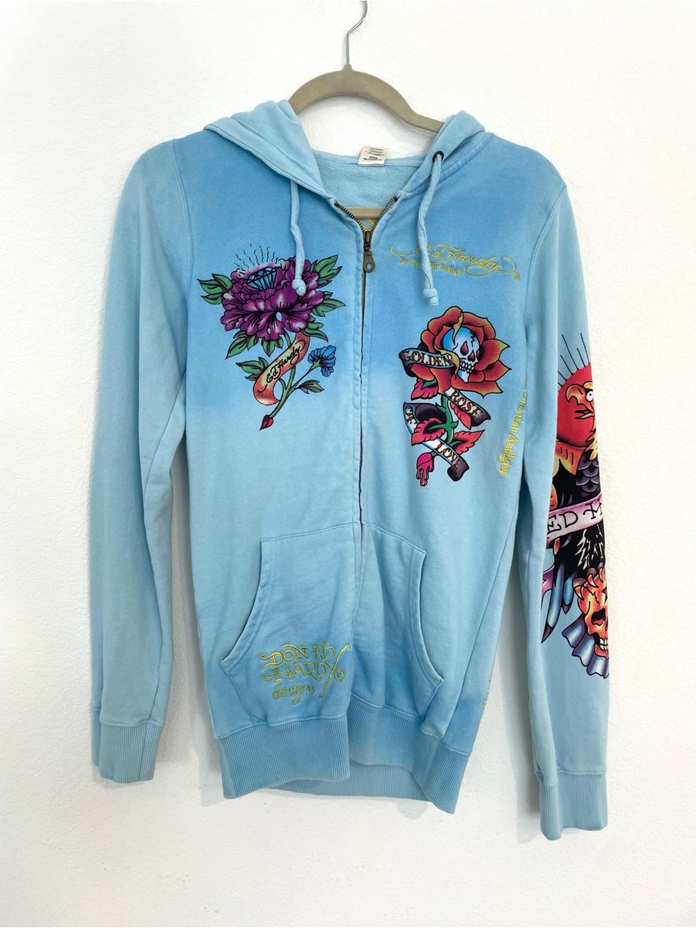 Ed Hardy Light Blue Zip-Up Hoodie with Floral & Tattoo Graphics